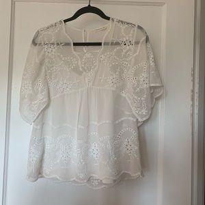 Anthro gently used silk embroidered blouse !